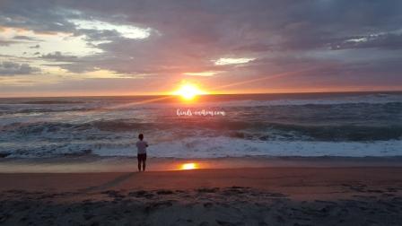 admiring the waves and the sunset